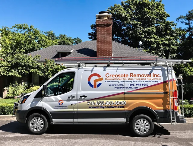 Avon Chimney Sweep technician removing creosote safely in Avon, OH